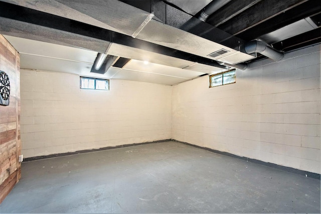 basement featuring plenty of natural light