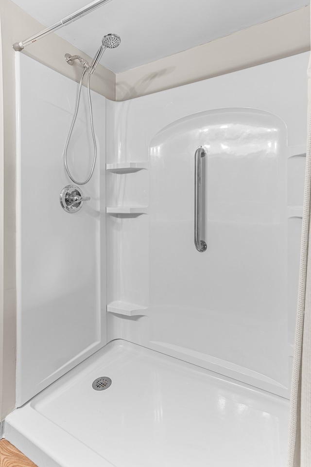 bathroom featuring walk in shower