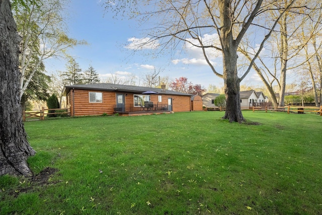 view of yard featuring fence and a patio area