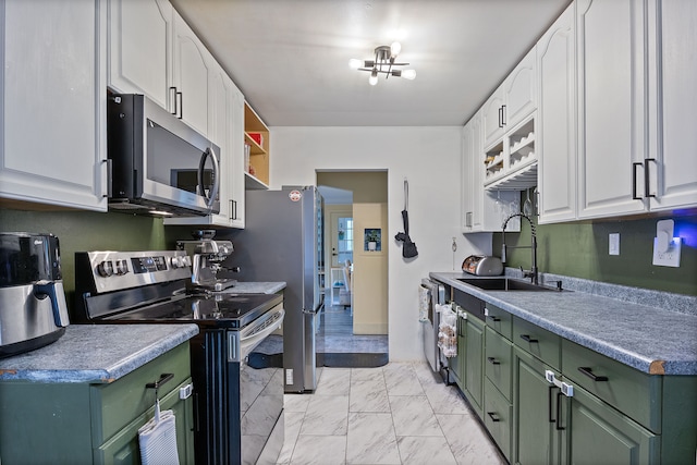 21160 Inkster Rd, Southfield, MI 48033 - kitchen with a sink, green cabinets, stainless steel appliances, and white cabinetry