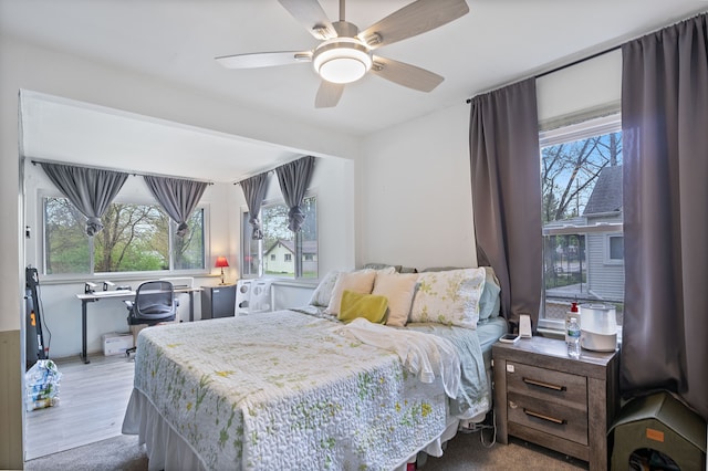21160 Inkster Rd, Southfield, MI 48033 - bedroom with a ceiling fan and wood finished floors