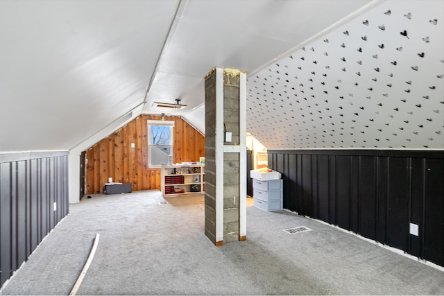 21160 Inkster Rd, Southfield, MI 48033 - bonus room featuring wooden walls, carpet floors, visible vents, and lofted ceiling