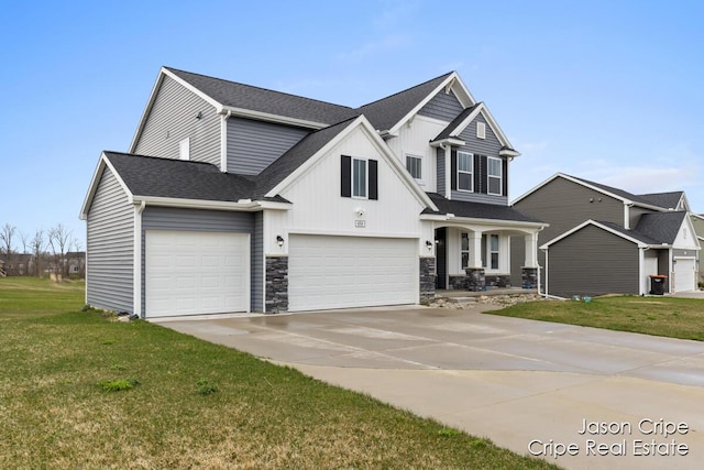 view of front of home featuring concrete driveway, stone siding, a front lawn, a garage, and a shingled roof