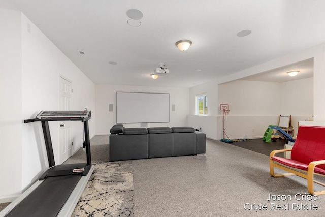 living area with baseboards and carpet floors