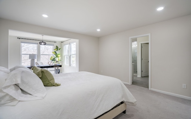 bedroom with baseboards, recessed lighting, light colored carpet, and multiple windows