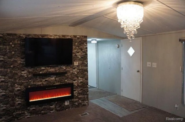 50594 Oregon Ave, Novi, MI 48374 - unfurnished living room with visible vents, an inviting chandelier, a stone fireplace, vaulted ceiling, and carpet flooring