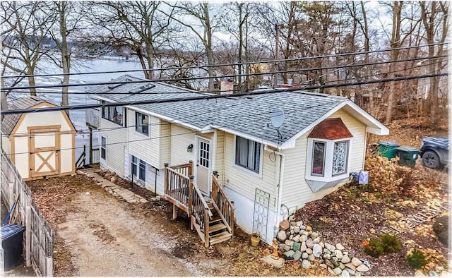 520 Bellevue Ave, Lake Orion, MI 48362 - view of property exterior featuring a shingled roof