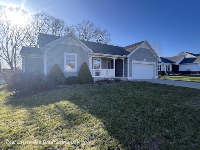 8311 Goldfinch Rd, Freeland, MI 48623 - single story home featuring a porch, an attached garage, a front lawn, and concrete driveway