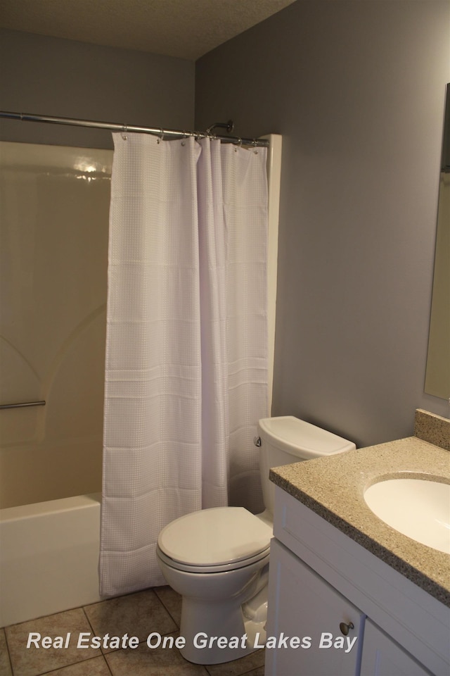 8311 Goldfinch Rd, Freeland, MI 48623 - full bathroom with vanity, tile patterned flooring, and shower / bath combo