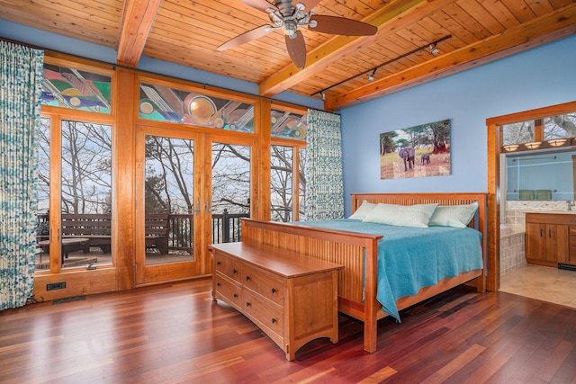 bedroom featuring track lighting, wooden ceiling, wood-type flooring, beamed ceiling, and multiple windows