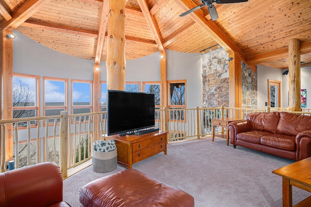 living room featuring wooden ceiling, beamed ceiling, carpet floors, high vaulted ceiling, and ceiling fan