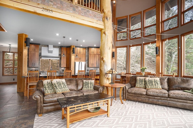 living room with recessed lighting and a healthy amount of sunlight
