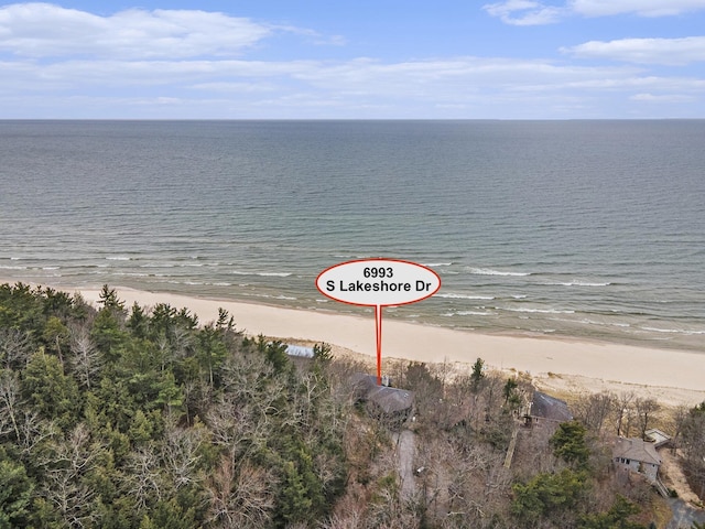 aerial view with a beach view and a water view