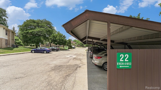61043 Greenwood Dr # 167, South Lyon, MI 48178 - view of covered parking lot