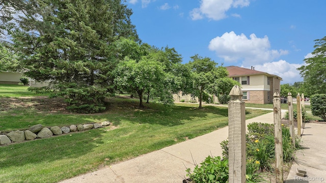 61043 Greenwood Dr # 167, South Lyon, MI 48178 - view of green lawn