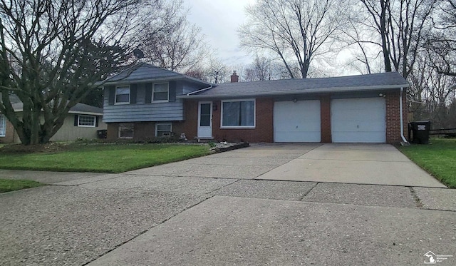 7303 Cranbrook Dr, Lambertville, MI 48144 - split level home featuring a chimney, a front yard, brick siding, concrete driveway, and an attached garage