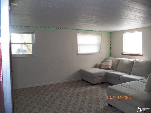 7303 Cranbrook Dr, Lambertville, MI 48144 - living room featuring baseboards, wood ceiling, a wealth of natural light, and dark colored carpet
