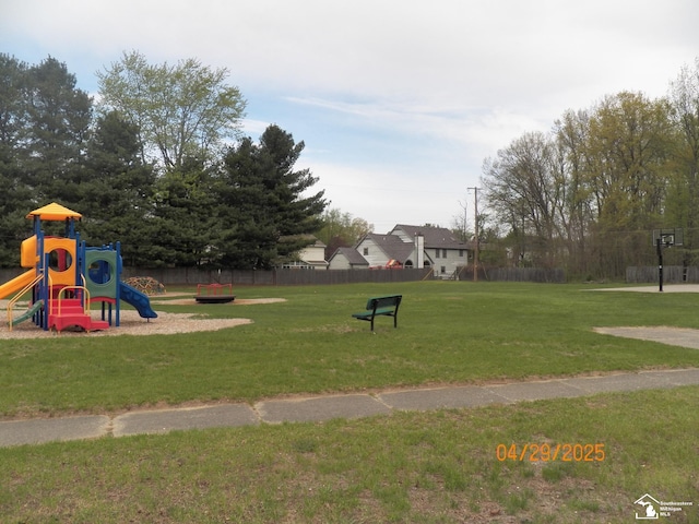 7303 Cranbrook Dr, Lambertville, MI 48144 - view of community featuring a lawn, fence, and playground community
