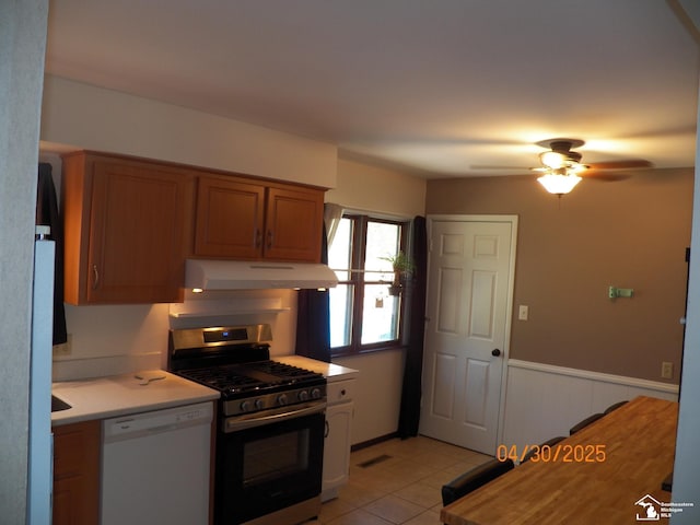 7303 Cranbrook Dr, Lambertville, MI 48144 - kitchen featuring ceiling fan, dishwasher, stainless steel range with gas stovetop, light countertops, and under cabinet range hood