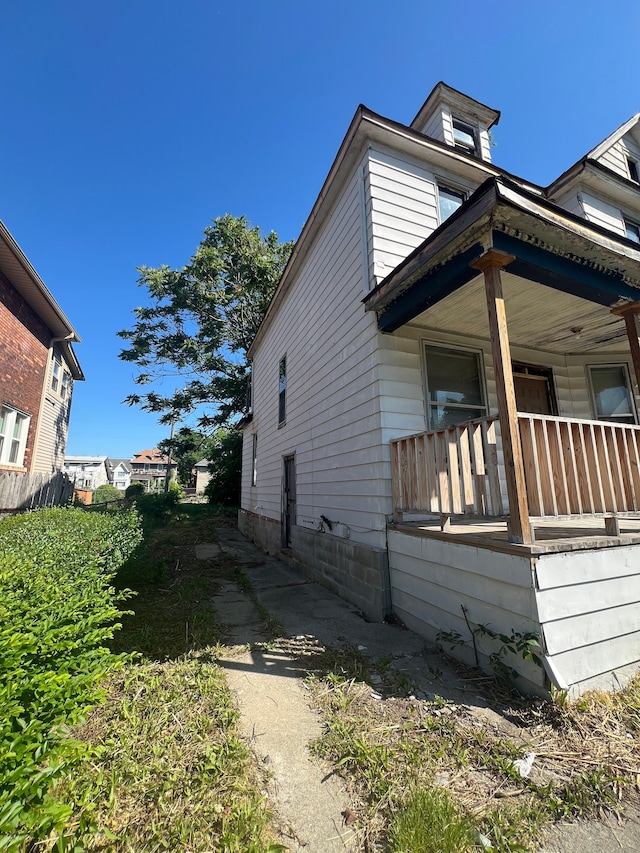207 Connecticut St, Highland Park, MI 48203 - view of side of property featuring a porch