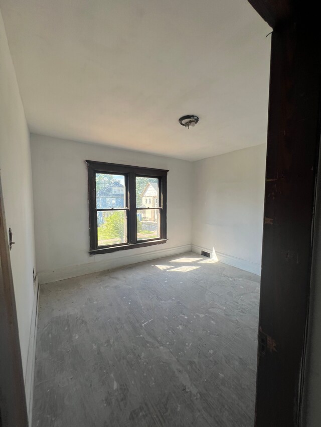 207 Connecticut St, Highland Park, MI 48203 - unfurnished room with baseboards
