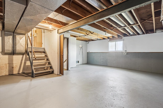 basement featuring stairway