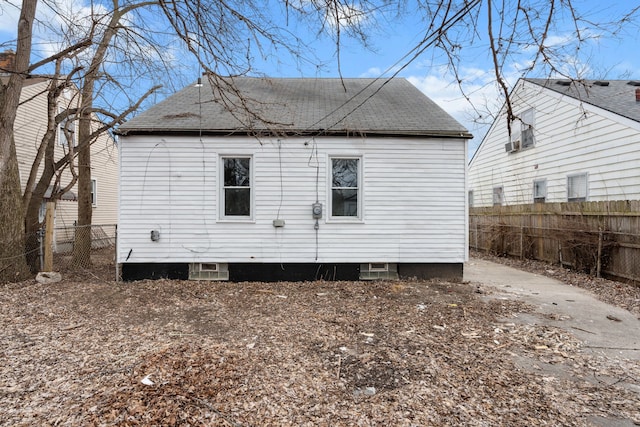 19319 Huntington Rd, Detroit, MI 48219 - rear view of property with fence and roof with shingles