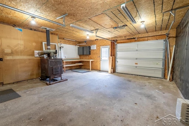 garage featuring a wood stove