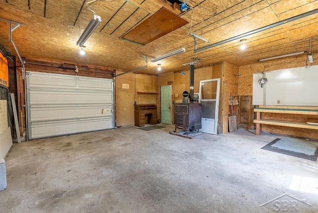 garage featuring a wood stove