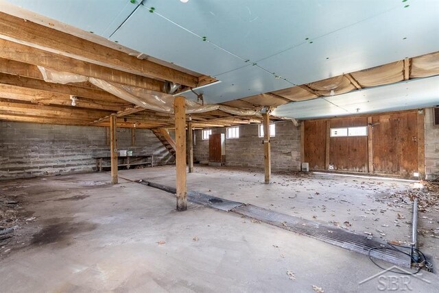 basement featuring plenty of natural light