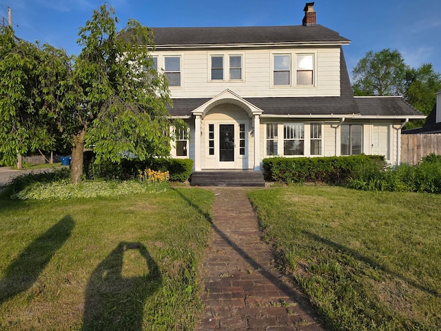 336 N Riverview Dr, Parchment, MI 49004 - view of front of house featuring a chimney and roof with shingles
