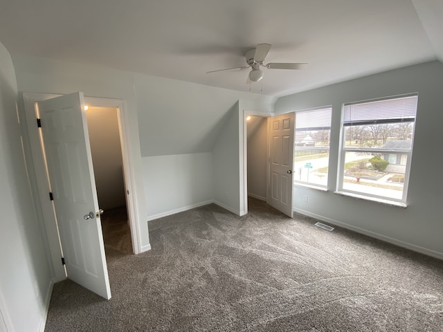 bonus room with baseboards, a ceiling fan, carpet flooring, and visible vents