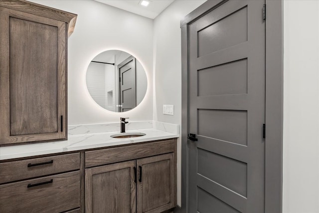 bathroom with vanity and recessed lighting
