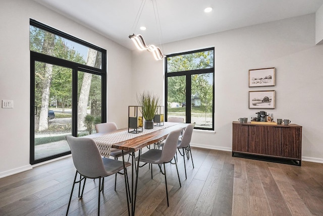 2359 Elinor Ln SE, East Grand Rapids, MI 49506 - dining area with baseboards, a wealth of natural light, and recessed lighting