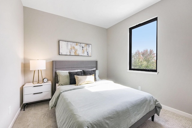 2359 Elinor Ln SE, East Grand Rapids, MI 49506 - bedroom with baseboards and carpet flooring