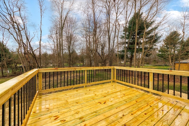 deck with view of wooded area