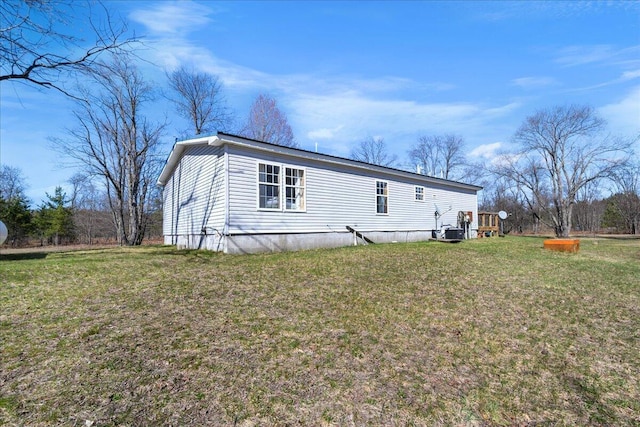 4638 W Mena Creek Xing, White Cloud, MI 49349 - back of property with a yard