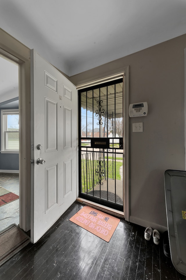 14424 Edmore Dr, Detroit, MI 48205 - foyer entrance with baseboards and dark wood-style flooring