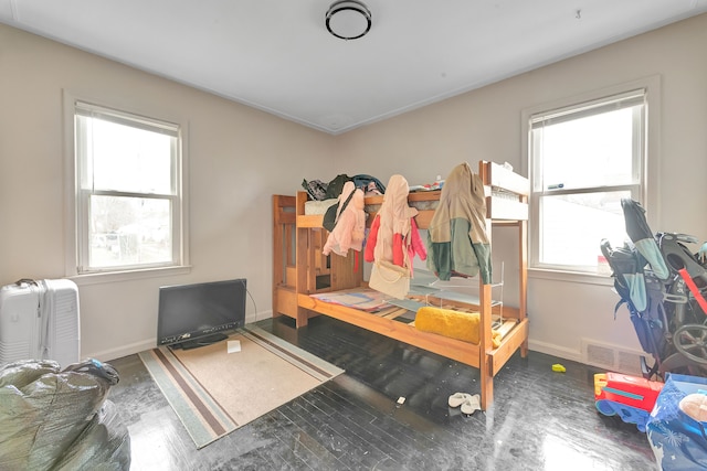 14424 Edmore Dr, Detroit, MI 48205 - bedroom featuring visible vents, baseboards, and multiple windows