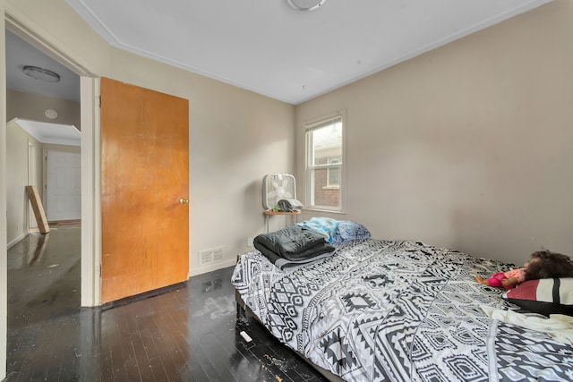 14424 Edmore Dr, Detroit, MI 48205 - bedroom featuring hardwood / wood-style floors, baseboards, and visible vents