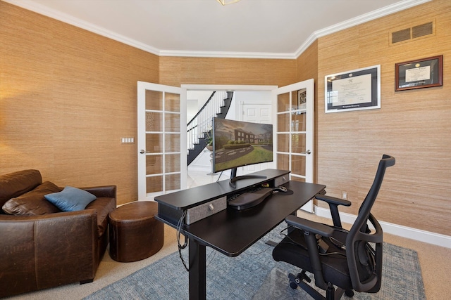carpeted home office with ornamental molding, french doors, and visible vents