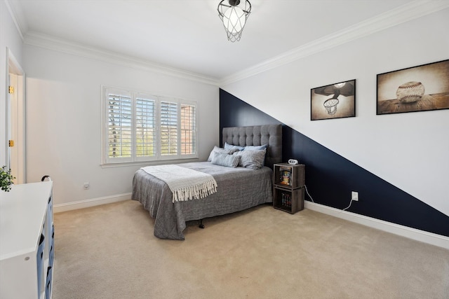 bedroom featuring crown molding, baseboards, and light carpet