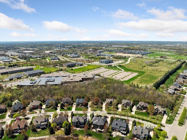 birds eye view of property with a residential view