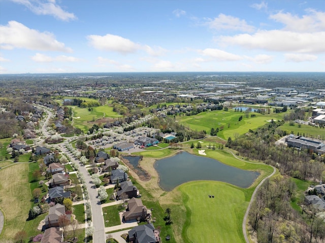drone / aerial view with a residential view and a water view