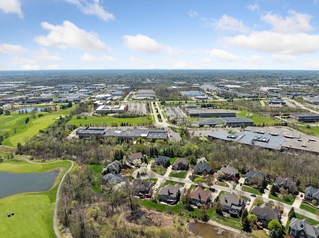 aerial view with a water view, golf course view, and a residential view