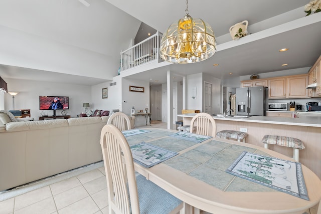 dining room with recessed lighting, an inviting chandelier, visible vents, and light tile patterned floors