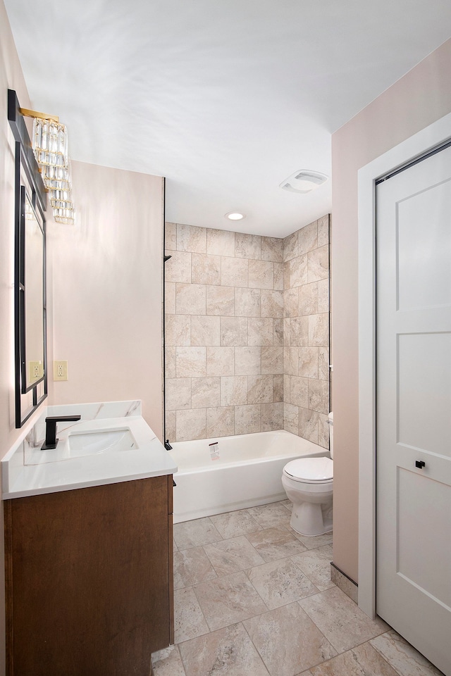 full bath with shower / bath combination, vanity, and toilet