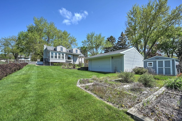 390 Red Oak Ln, Rochester Hills, MI 48307 - view of yard featuring an outdoor structure, a garage, and a shed