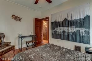 interior space with a ceiling fan and wood finished floors