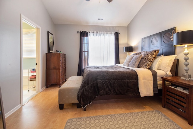 bedroom with baseboards, visible vents, and light wood finished floors